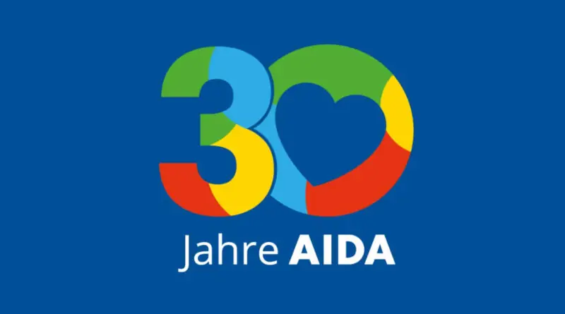 Grafik mit der Aufschrift „30 Jahre AIDA“ und einem bunten Herz auf blauem Hintergrund.